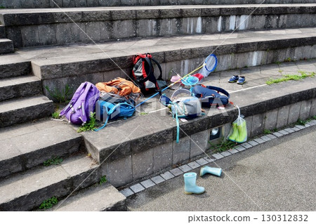 Children's belongings scattered in a park Children's belongings scattered in a park 130312832