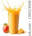 Mango smoothie splash with fresh mango cubes, isolated on white background 130313008