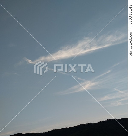 A series of cirrus clouds flying over the mountains 130313148