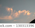 Summer evening sky: crimson clouds lining the mountains 130313396