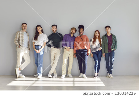 Positive Multinational People Group on Gray Background Positive Multinational People Group on Gray Background 130314229