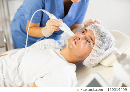 Using Skin Scrubber attachment 130314499