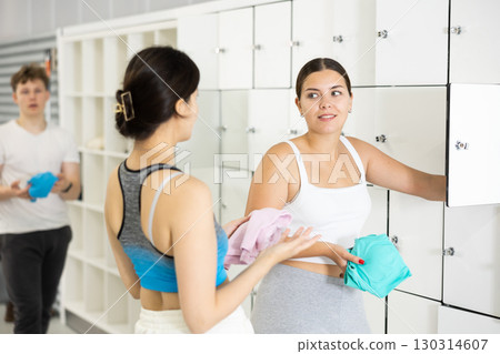 Women exchanged couple of phrases in ladies locker room after changing clothes Women exchanged couple of phrases in ladies locker room after changing clothes 130314607