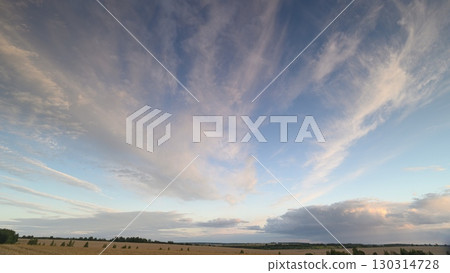 A Stunning and Beautiful Evening Sky Adorned with Dramatic and Intricate Cloud Patterns A Stunning and Beautiful Evening Sky Adorned with Dramatic and Intricate Cloud Patterns 130314728
