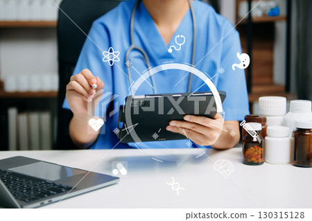 Medicine doctor woman hand working with computer virtual dashboard as medical network concept Health care, medical 130315128