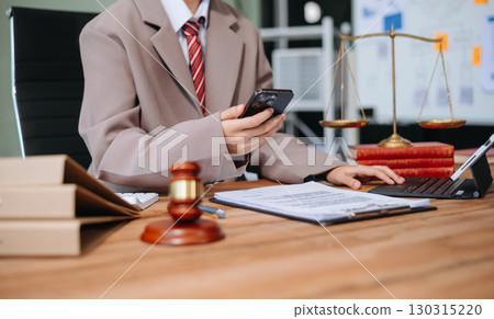 justice and law concept.law the desk, books, balance. male judge in a courtroom the gavel,working with digital tablet, smartphone 130315220