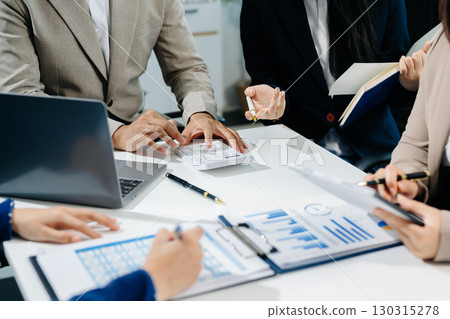 Business team collaboration discussing working analyzing with financial data and marketing growth report graph Business team collaboration discussing working analyzing with financial data and marketing growth report graph 130315278