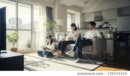 Family gathering relaxing in the living room 130315314