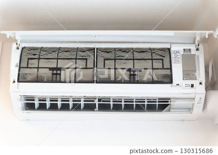 Cleaning dirty air conditioner filters 130315686