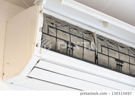 Cleaning dirty air conditioner filters Cleaning dirty air conditioner filters 130315697
