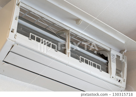 Cleaning dirty air conditioner filters 130315718
