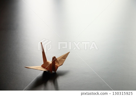 Folded paper crane 130315925