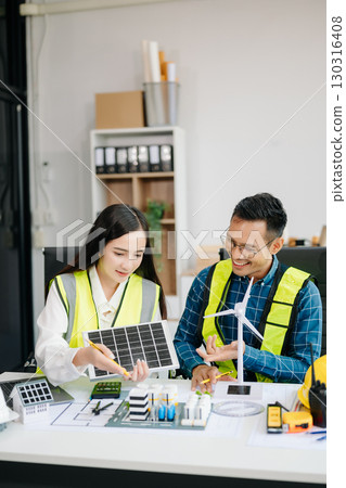 usiness people having consultation about wind energy at company office. on architectural project site and making model house usiness people having consultation about wind energy at company office. on architectural project site and making model house 130316408