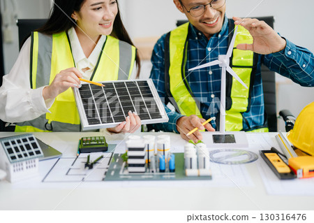usiness people having consultation about wind energy at company office. on architectural project site and making model house usiness people having consultation about wind energy at company office. on architectural project site and making model house 130316476