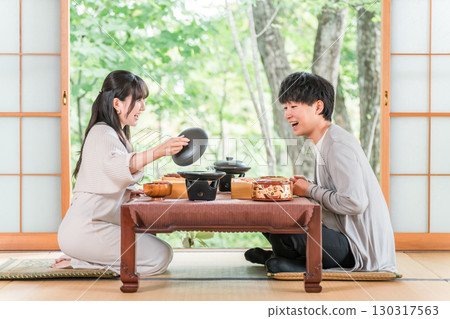 Married couples and couples enjoying kaiseki cuisine at a ryokan (in-room dining, kaiseki cuisine, set menu, luxury) 130317563