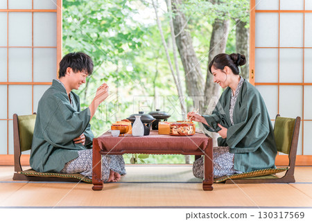 Married couples and couples enjoying kaiseki cuisine at a hot spring inn (in-room dining, kaiseki cuisine, set menu, luxury) Married couples and couples enjoying kaiseki cuisine at a hot spring inn (in-room dining, kaiseki cuisine, set menu, luxury) 130317569