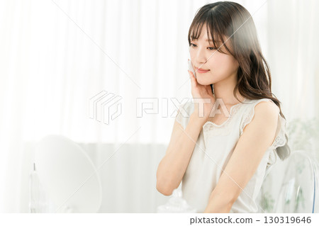 Woman skincare to moisturize skin 130319646