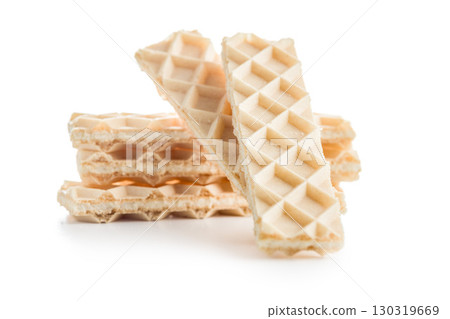 Sweet crispy wafers isolated on white background. Sweet crispy wafers isolated on white background. 130319669
