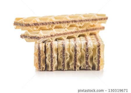 Sweet crispy wafers isolated on white background. Sweet crispy wafers isolated on white background. 130319671