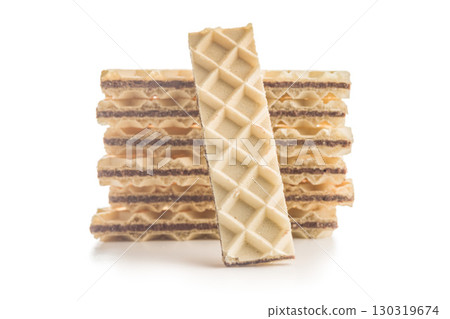 Sweet crispy wafers isolated on white background. Sweet crispy wafers isolated on white background. 130319674