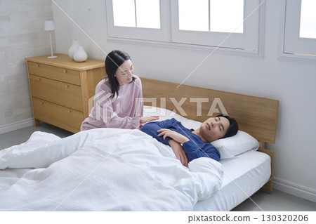 A wife waking up her husband in the morning A wife waking up her husband in the morning 130320206
