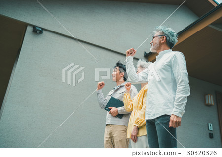 A young housing salesman and a senior couple 130320326