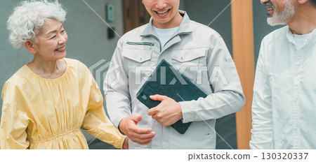 A reliable housing salesman and a senior couple A reliable housing salesman and a senior couple 130320337