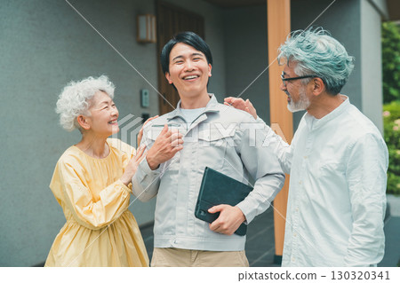 A reliable housing salesman and a senior couple 130320341