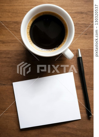 Cup of Black Coffee with Blank Paper and Pen on Wooden Desk. Cup of Black Coffee with Blank Paper and Pen on Wooden Desk. 130320537
