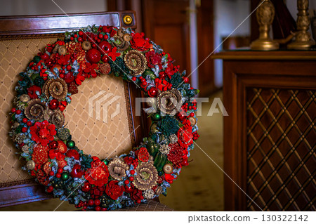 Christmas wreath decoration on a wooden door Christmas wreath decoration on a wooden door 130322142