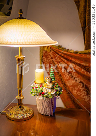 Christmas table composition. Beautiful decoration. Christmas trees, candles, stars, lights and elegant accessories. Merry Christmas and Happy Holidays, Template. 130322149