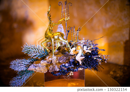 Christmas table composition. Beautiful decoration. Christmas trees, candles, stars, lights and elegant accessories. Merry Christmas and Happy Holidays, Template. Christmas table composition. Beautiful decoration. Christmas trees, candles, stars, lights and elegant accessories. Merry Christmas and Happy Holidays, Template. 130322154