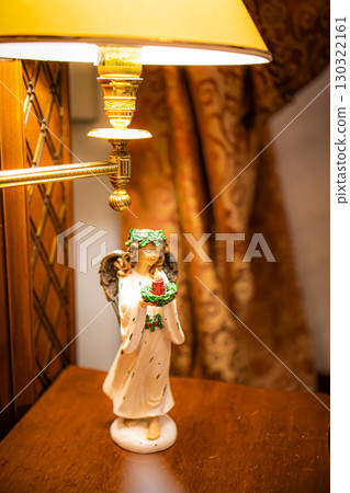 Christmas table composition. Beautiful decoration. Christmas trees, candles, stars, lights and elegant accessories. Merry Christmas and Happy Holidays, Template. 130322161