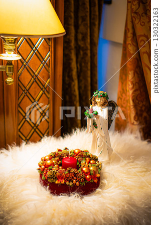 Christmas table composition. Beautiful decoration. Christmas trees, candles, stars, lights and elegant accessories. Merry Christmas and Happy Holidays, Template. 130322163
