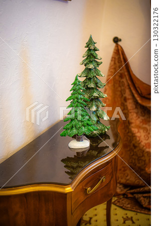 Christmas table composition. Beautiful decoration. Christmas trees, candles, stars, lights and elegant accessories. Merry Christmas and Happy Holidays, Template. Christmas table composition. Beautiful decoration. Christmas trees, candles, stars, lights and elegant accessories. Merry Christmas and Happy Holidays, Template. 130322176