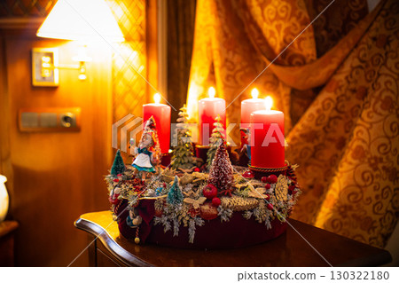 Christmas table composition. Beautiful decoration. Christmas trees, candles, stars, lights and elegant accessories. Merry Christmas and Happy Holidays, Template. 130322180