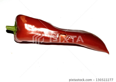 Home grown chilli pepper vegetable wonky and damaged eaten by slugs and pests ruined Home grown chilli pepper vegetable wonky and damaged eaten by slugs and pests ruined 130322277