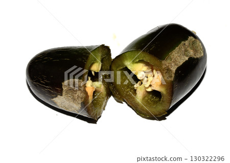 Home grown chilli pepper vegetable wonky and damaged eaten by slugs and pests ruined 130322296