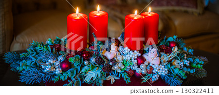 Christmas table composition. Beautiful decoration. Christmas trees, candles, stars, lights and elegant accessories. Merry Christmas and Happy Holidays, Template. 130322411