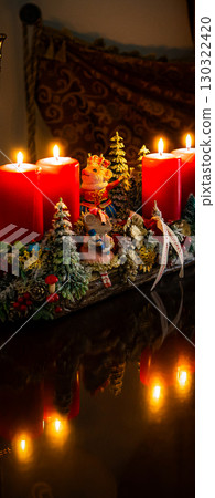 Christmas table composition. Beautiful decoration. Christmas trees, candles, stars, lights and elegant accessories. Merry Christmas and Happy Holidays, Template. 130322420