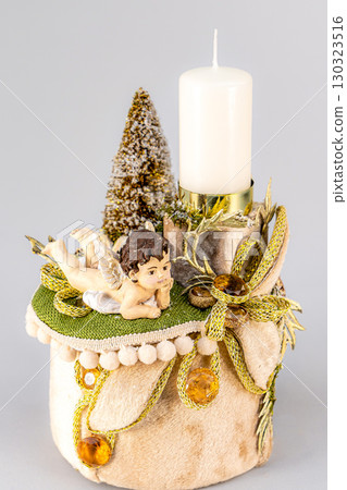 Christmas table composition. Beautiful decoration. Christmas trees, candles, stars, lights and elegant accessories. Merry Christmas and Happy Holidays, Template. 130323516