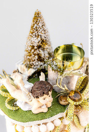 Christmas table composition. Beautiful decoration. Christmas trees, candles, stars, lights and elegant accessories. Merry Christmas and Happy Holidays, Template. 130323519