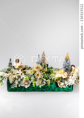 Christmas table composition. Beautiful decoration. Christmas trees, candles, stars, lights and elegant accessories. Merry Christmas and Happy Holidays, Template. 130323522