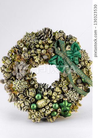 Christmas table composition. Beautiful decoration. Christmas trees, candles, stars, lights and elegant accessories. Merry Christmas and Happy Holidays, Template. 130323530