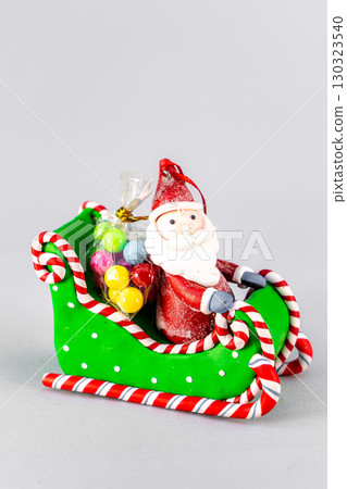 Christmas table composition. Beautiful decoration. Christmas trees, candles, stars, lights and elegant accessories. Merry Christmas and Happy Holidays, Template. Christmas table composition. Beautiful decoration. Christmas trees, candles, stars, lights and elegant accessories. Merry Christmas and Happy Holidays, Template. 130323540