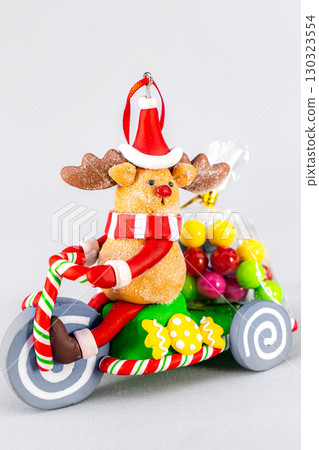 Christmas table composition. Beautiful decoration. Christmas trees, candles, stars, lights and elegant accessories. Merry Christmas and Happy Holidays, Template. 130323554