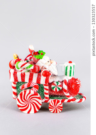 Christmas table composition. Beautiful decoration. Christmas trees, candles, stars, lights and elegant accessories. Merry Christmas and Happy Holidays, Template. Christmas table composition. Beautiful decoration. Christmas trees, candles, stars, lights and elegant accessories. Merry Christmas and Happy Holidays, Template. 130323557