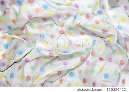 Crumpled paper with children's pencil crayon spotty polka dots background Crumpled paper with children's pencil crayon spotty polka dots background 130324422