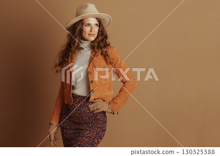 Confident Woman in Boho Autumn Attire 130325388