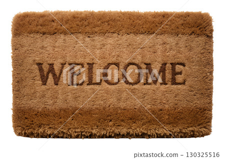Fluffy brown welcome mat with frayed edges, cozy doormat for home entrance isolated 130325516